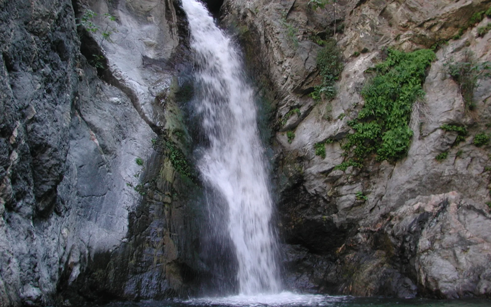 Eaton Falls in Eaton Canyon of the San Gabriel Mountains, showing water cascading into a natural pool